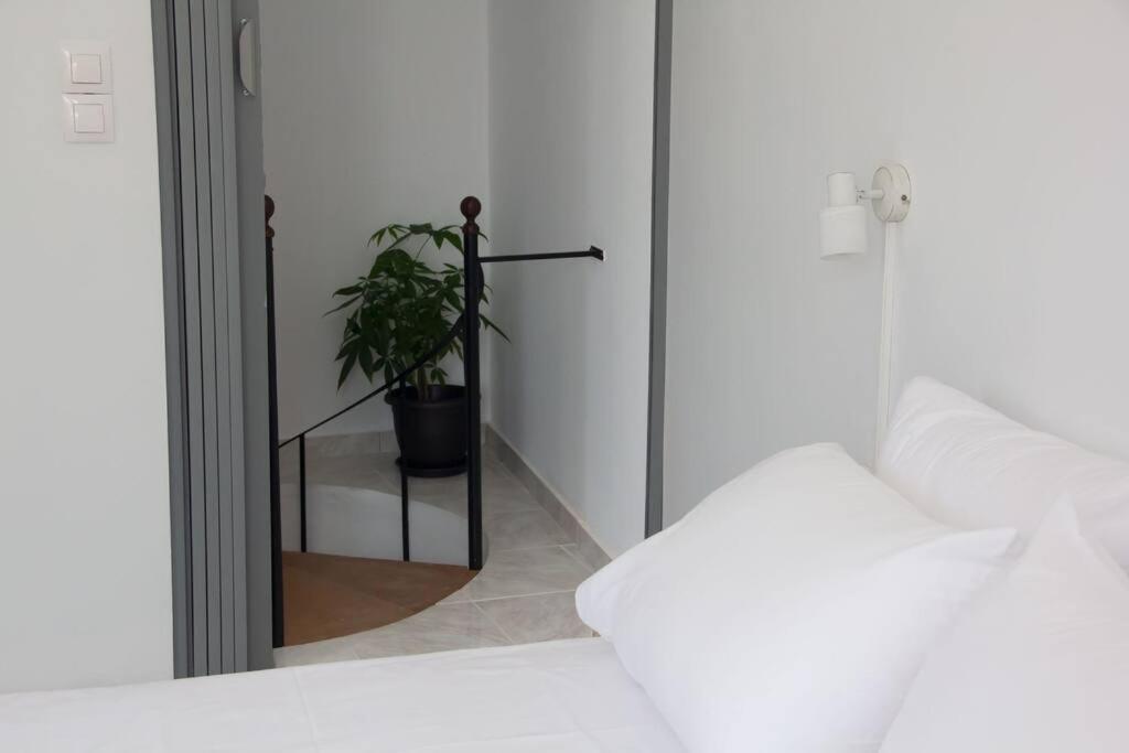 Arco Cοzy Loft Apartment แอร์มูโปลี ภายนอก รูปภาพ
